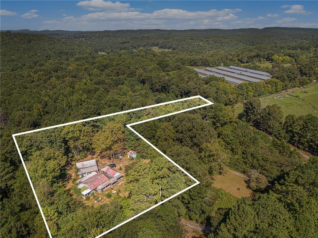 655 Hall Station Road Northwest Kingston, GA 30145 - Photo 2 of 17 a view of a balcony with an ocean