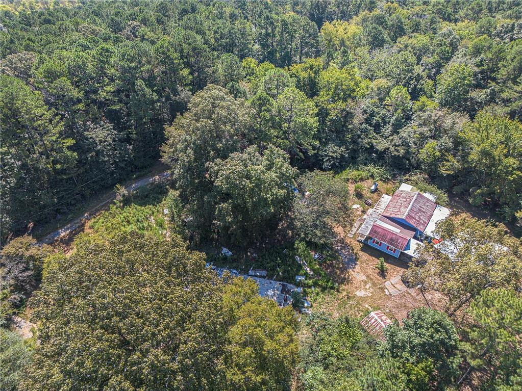 655 Hall Station Road Northwest Kingston, GA 30145 - Photo 10 of 17 an aerial view of residential house with outdoor space and trees all around