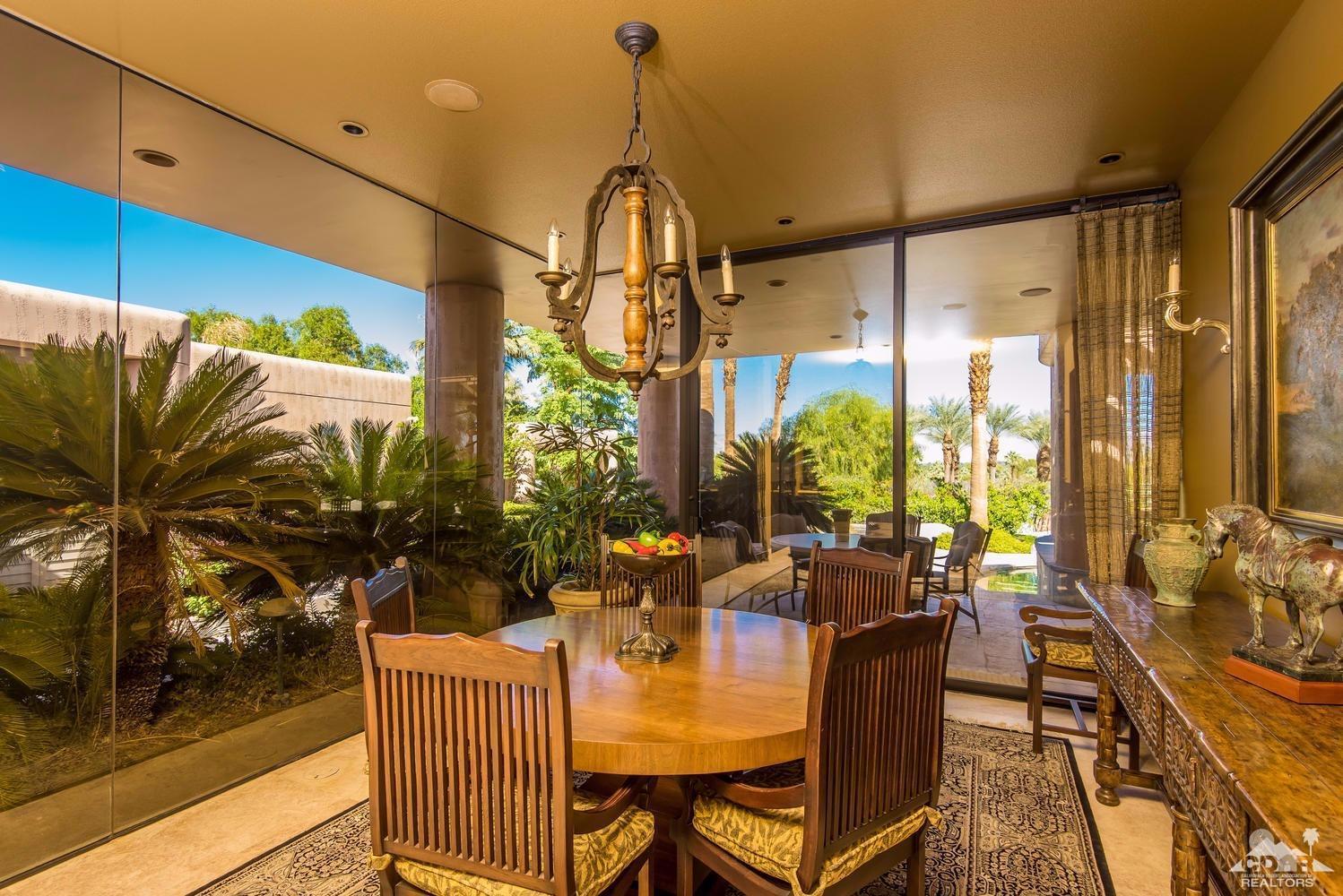 70416 Placerville Road Rancho Mirage, CA 92270 - Photo 11 of 32 a view of a dining room with furniture window and outside view