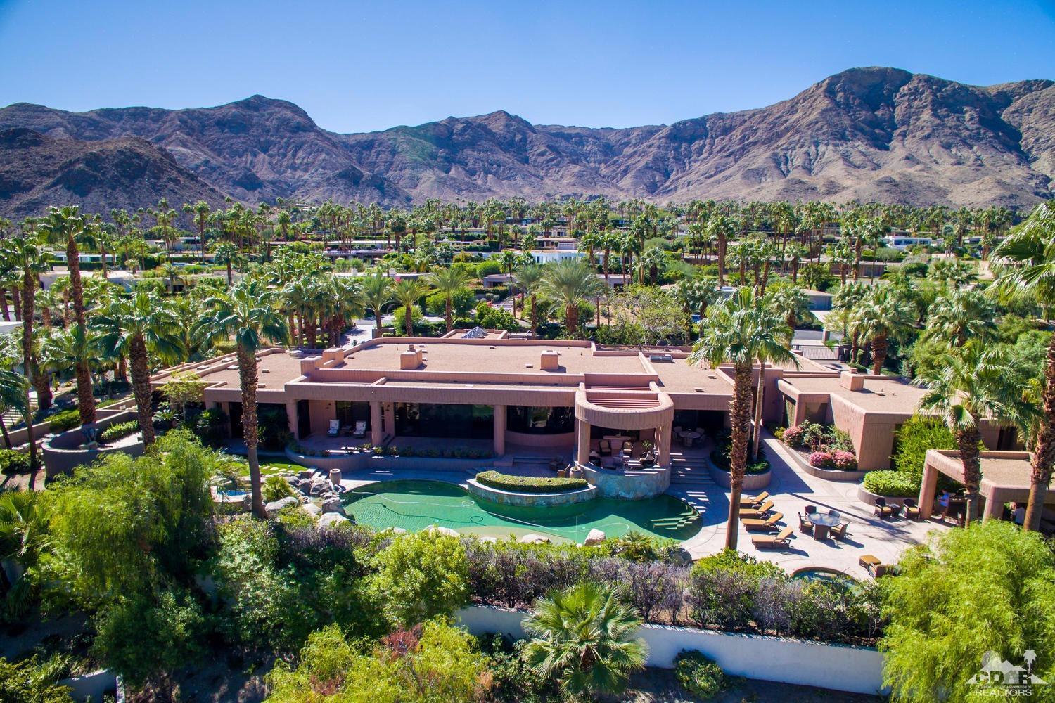 70416 Placerville Road Rancho Mirage, CA 92270 - Photo 4 of 32 an aerial view of a house with a garden
