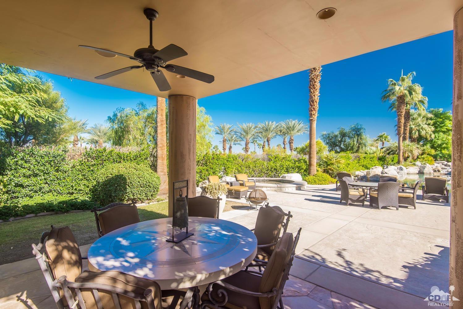 70416 Placerville Road Rancho Mirage, CA 92270 - Photo 31 of 32 a view of a dining room with furniture window and outside view