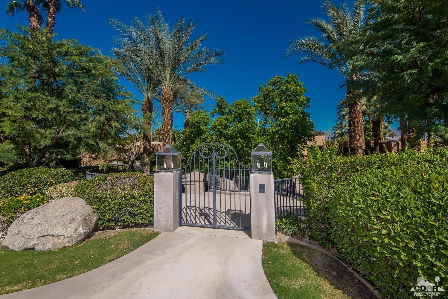 70416 Placerville Road Rancho Mirage, CA 92270 - Photo 6 of 32 a view of a backyard with a garden