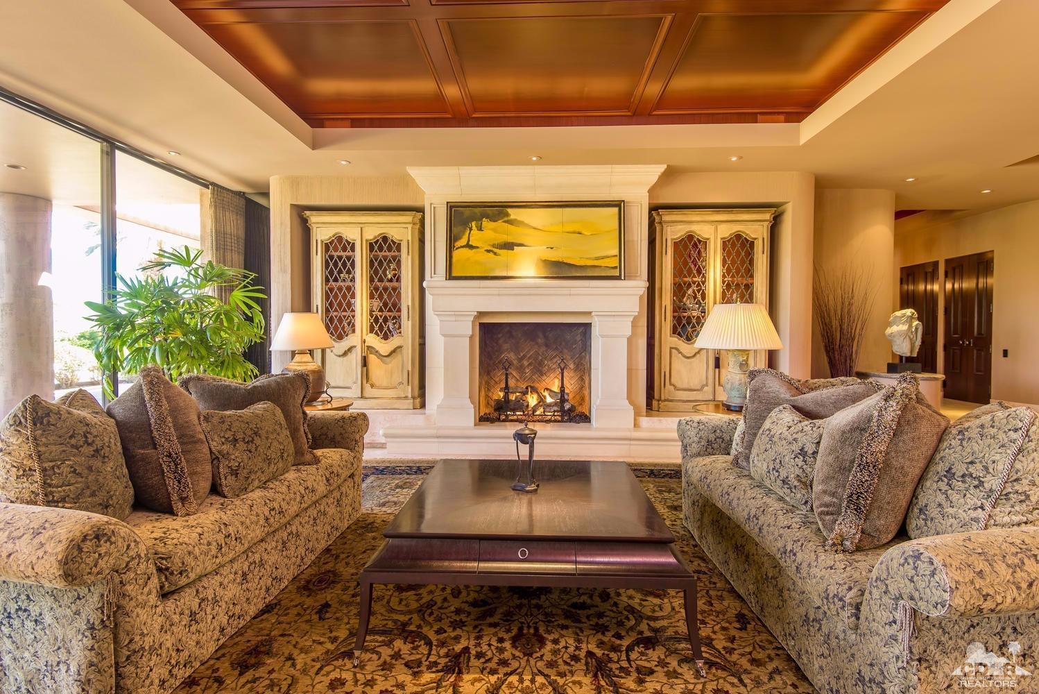 70416 Placerville Road Rancho Mirage, CA 92270 - Photo 8 of 32 a living room with furniture and a fireplace