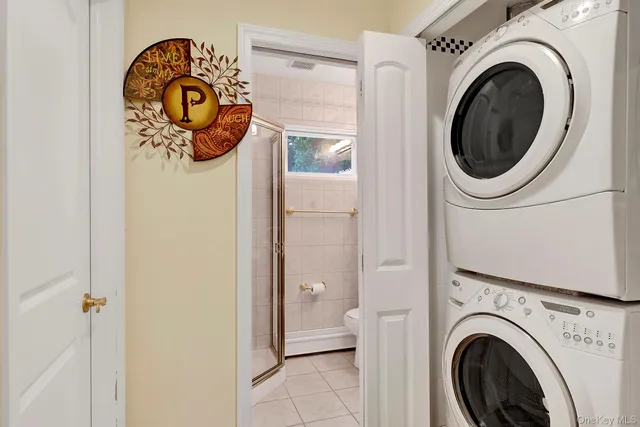 a kitchen with stainless steel appliances granite countertop a stove a refrigerator and a sink