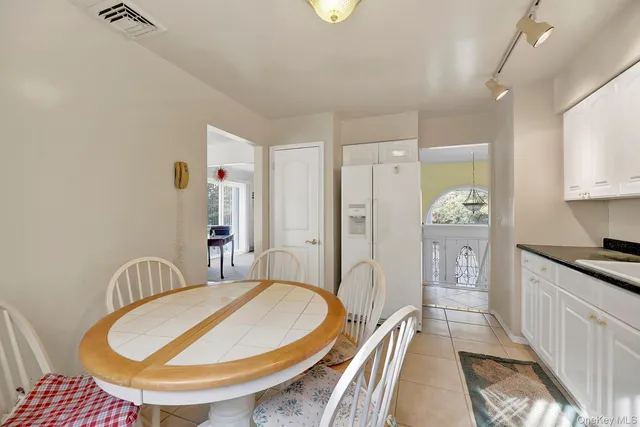 a view of living room filled with furniture and window