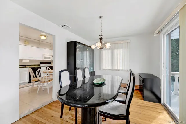 a view of a kitchen area with furniture