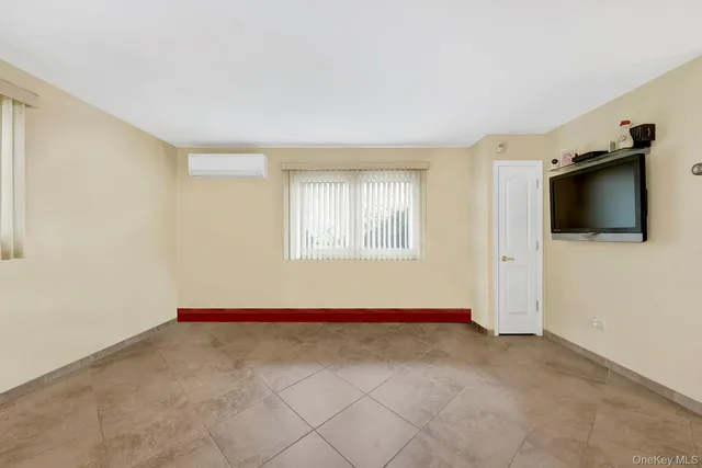 a view of livingroom with workspace