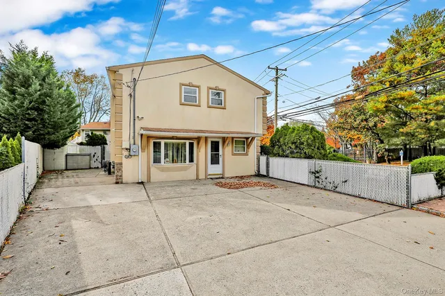 a view of a house with a garage