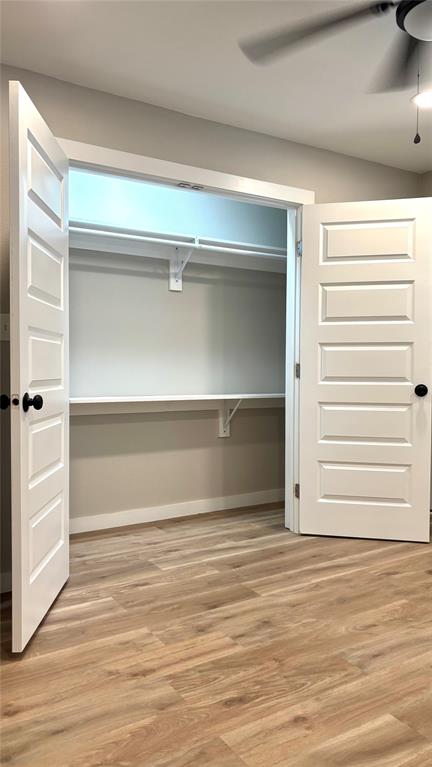 4603 Junius Street, Unit 8 Dallas, TX 75246 - Photo 13 of 15 a view of an empty walk in closet