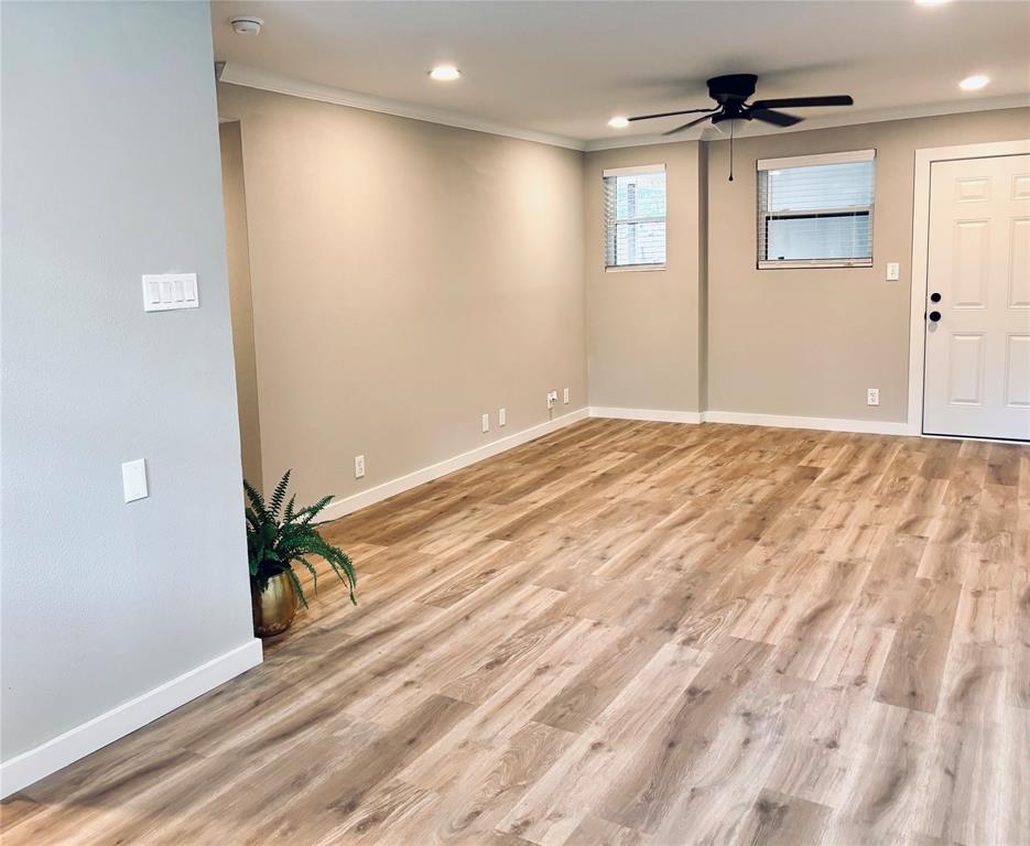 4603 Junius Street, Unit 8 Dallas, TX 75246 - Photo 3 of 15 a view of an empty room