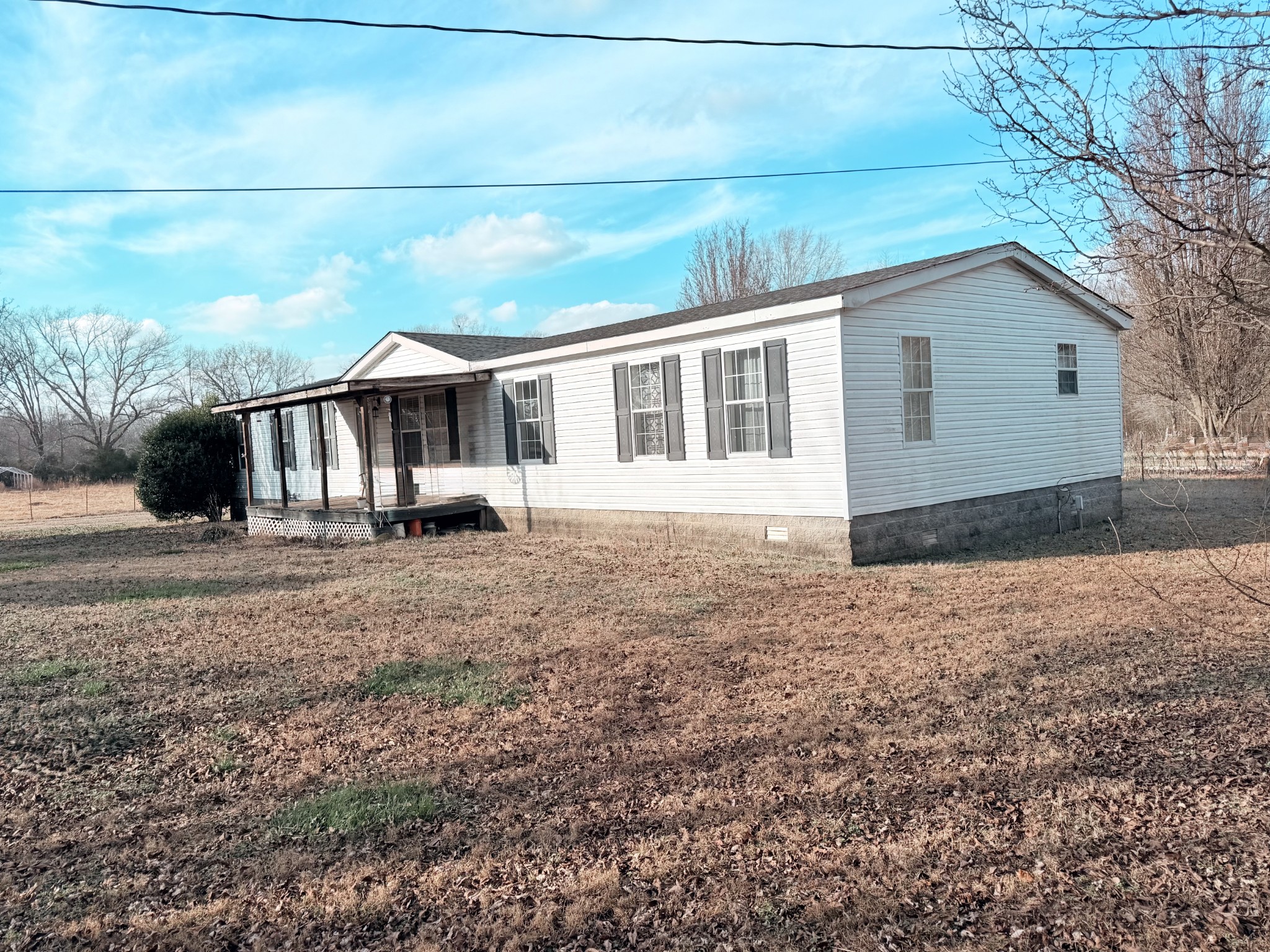 7010 Lynchburg Road Winchester, TN 37398 - Photo 2 of 22 a view of a house with a yard