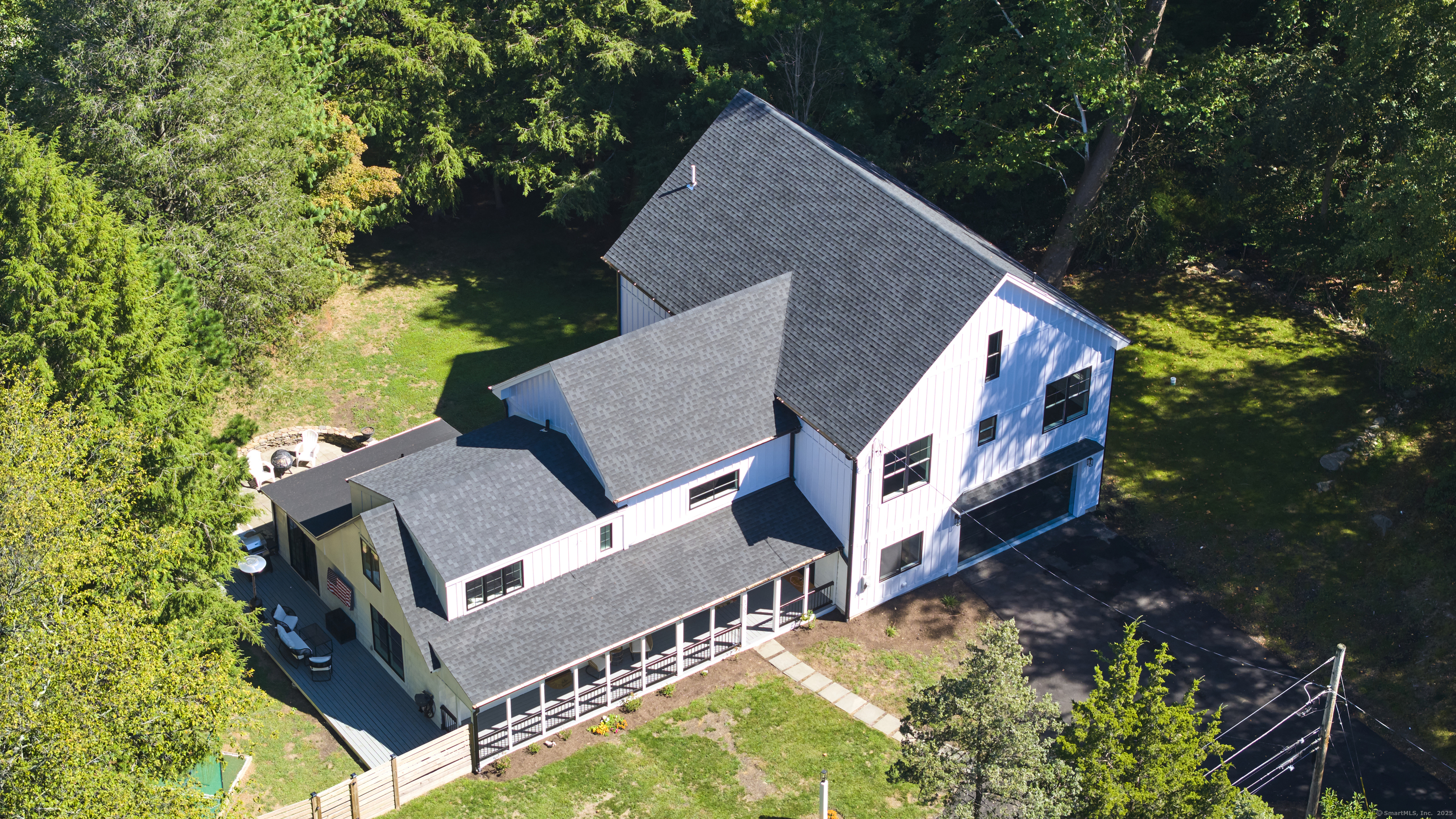 an aerial view of house with yard