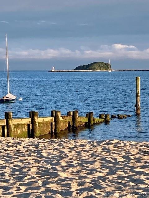 a view of swimming pool with outdoor seating
