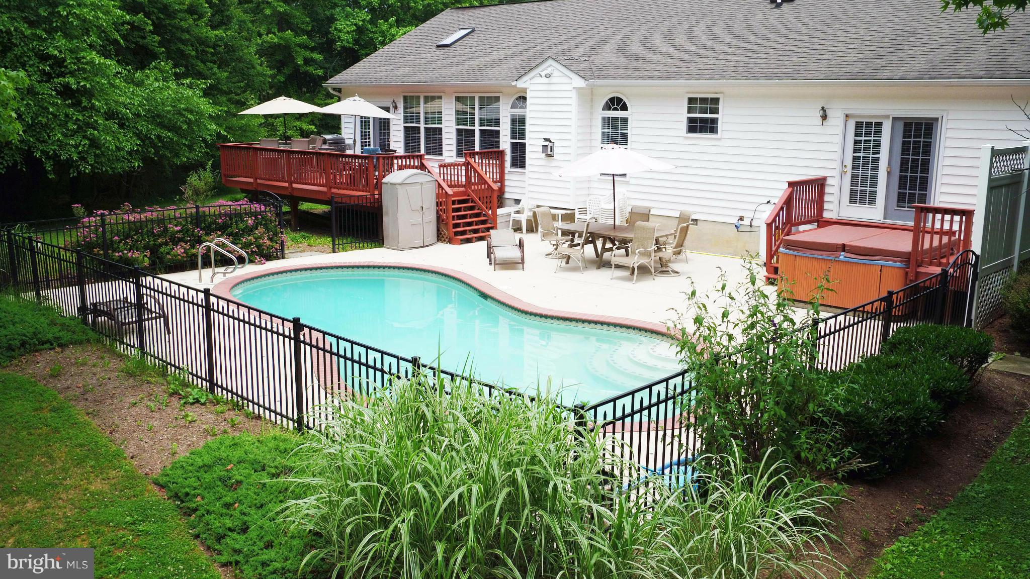 3602 Branhum Road Edgewater, MD 21037 - Photo 4 of 19 Private inground pool and deck with hot tub