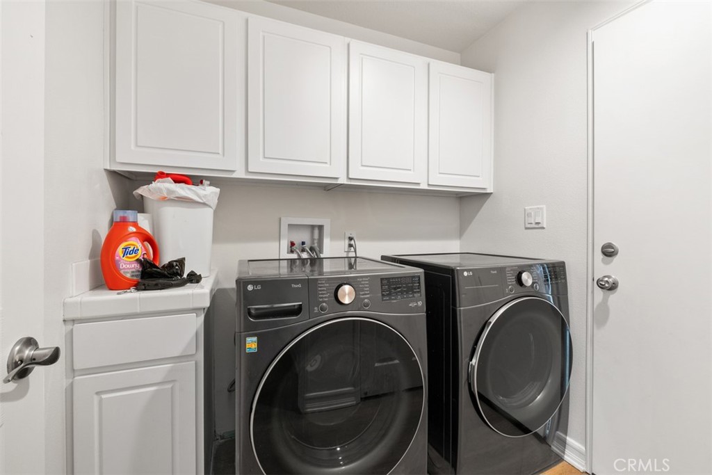 10 Thorp Ladera Ranch, CA 92694 - Photo 24 of 37 laundry and dryer on first floor next to garage