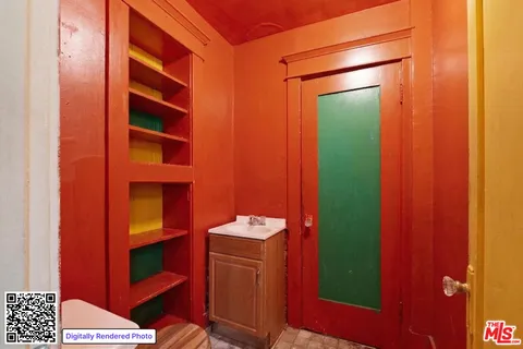 a room with closet and wooden door