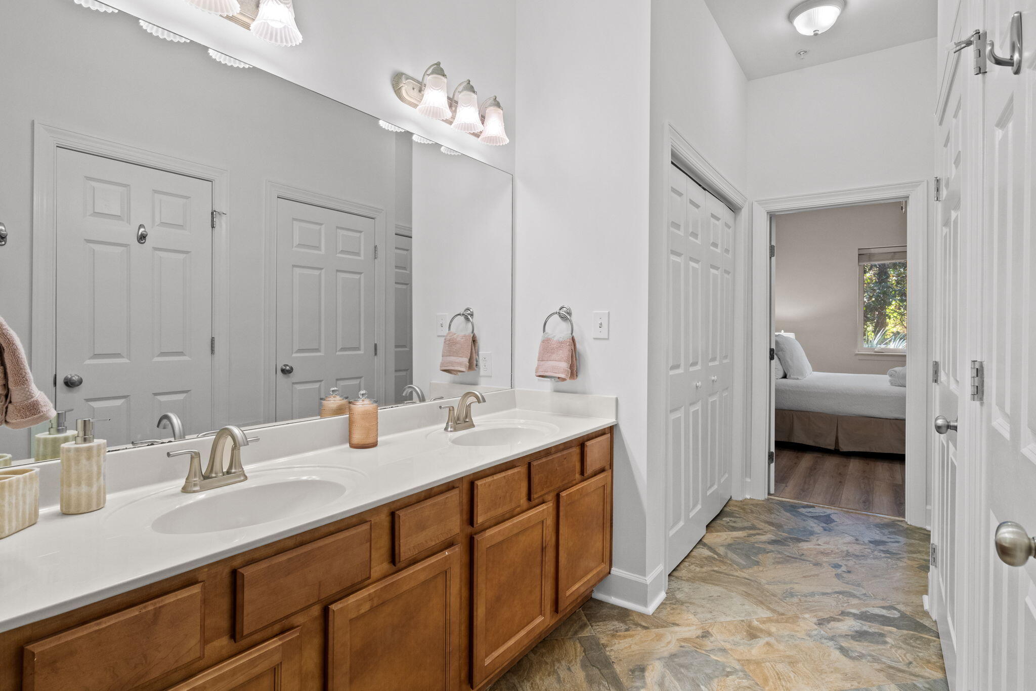 231 Somerset Bridge Road, Unit 2101 Santa Rosa Beach, FL 32459 - Photo 19 of 48 a en suite bathroom with a sink double vanity and a mirror