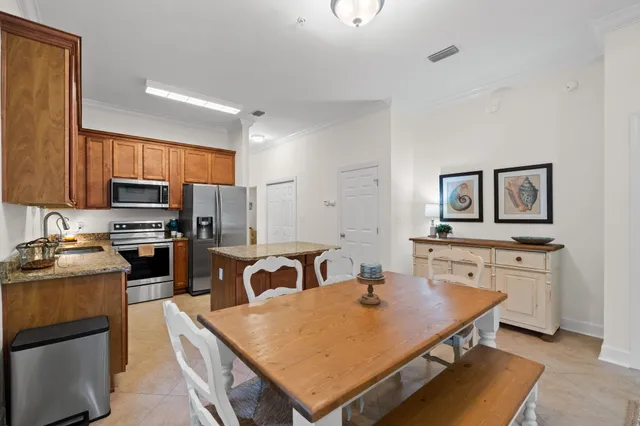 a en suite bathroom with a sink double vanity and a mirror