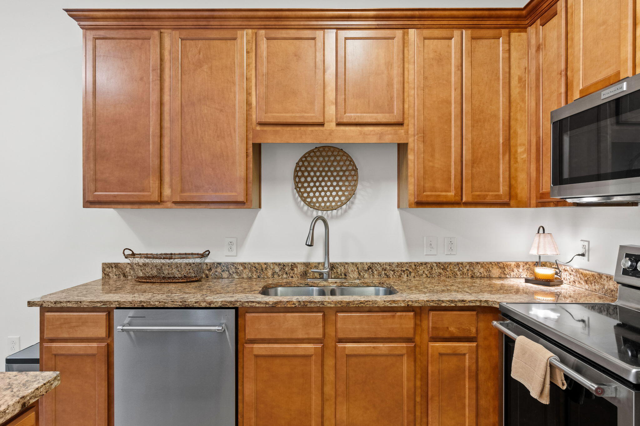 231 Somerset Bridge Road, Unit 2101 Santa Rosa Beach, FL 32459 - Photo 9 of 48 a kitchen with stainless steel appliances granite countertop a sink a stove and a microwave