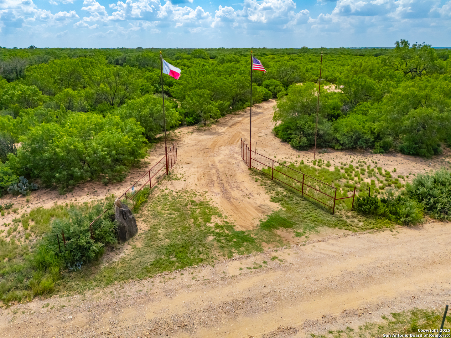 4614 County Road 5232 D'Hanis, TX 78850 - Photo 3 of 40 a view of a garden with a pathway