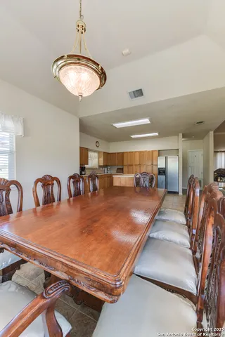 a view of a dining room with furniture