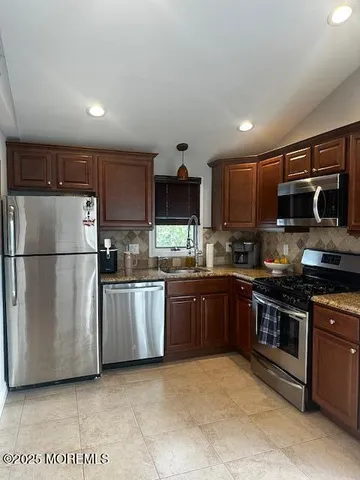 a view of a room that has a window in it