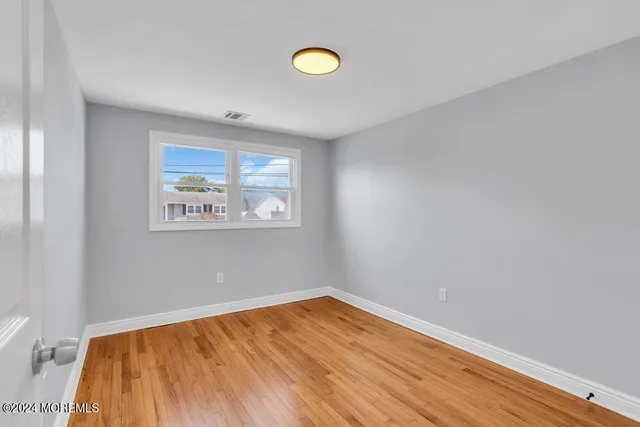 a view of a chairs and tables in patio