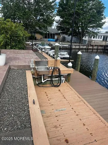 a view of house with outdoor seating space