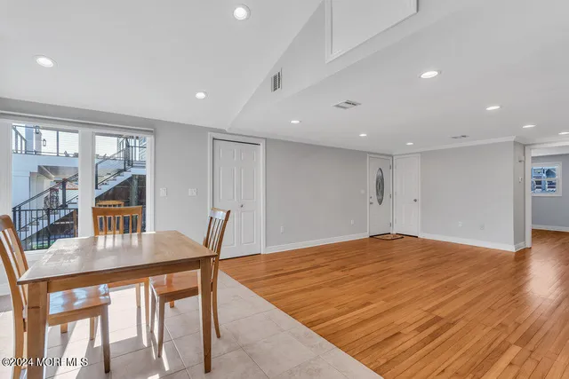 a kitchen with stainless steel appliances granite countertop a refrigerator stove a sink and dishwasher