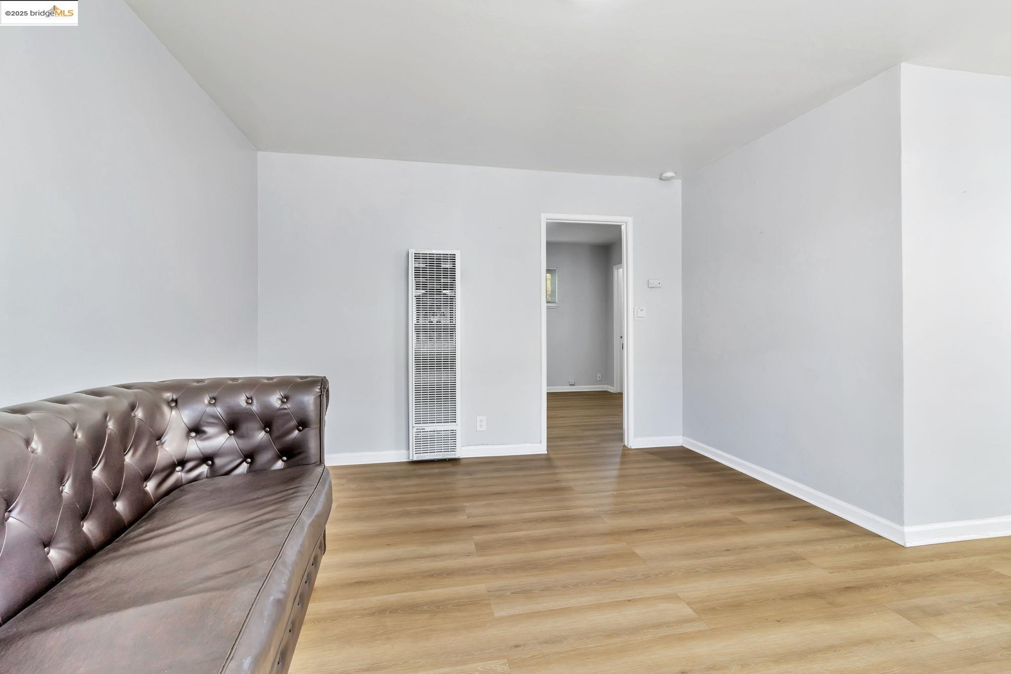 1626 Dwight Way Berkeley, CA 94703 - Photo 12 of 46 a view of an empty room and wooden floor