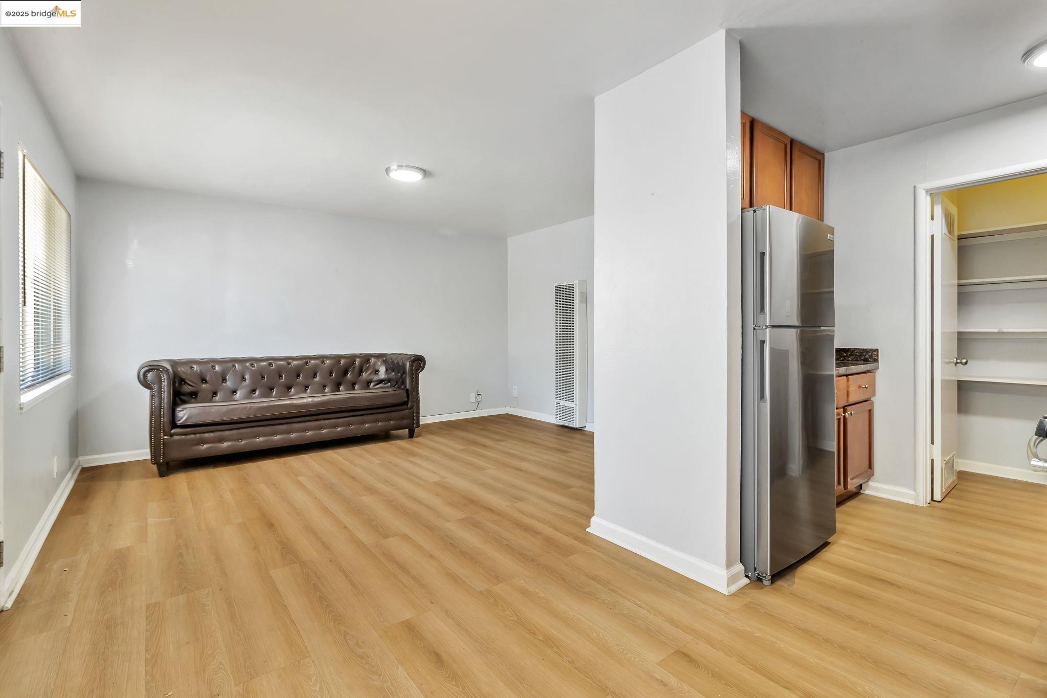 1626 Dwight Way Berkeley, CA 94703 - Photo 30 of 46 a view of kitchen and hallway with wooden floor