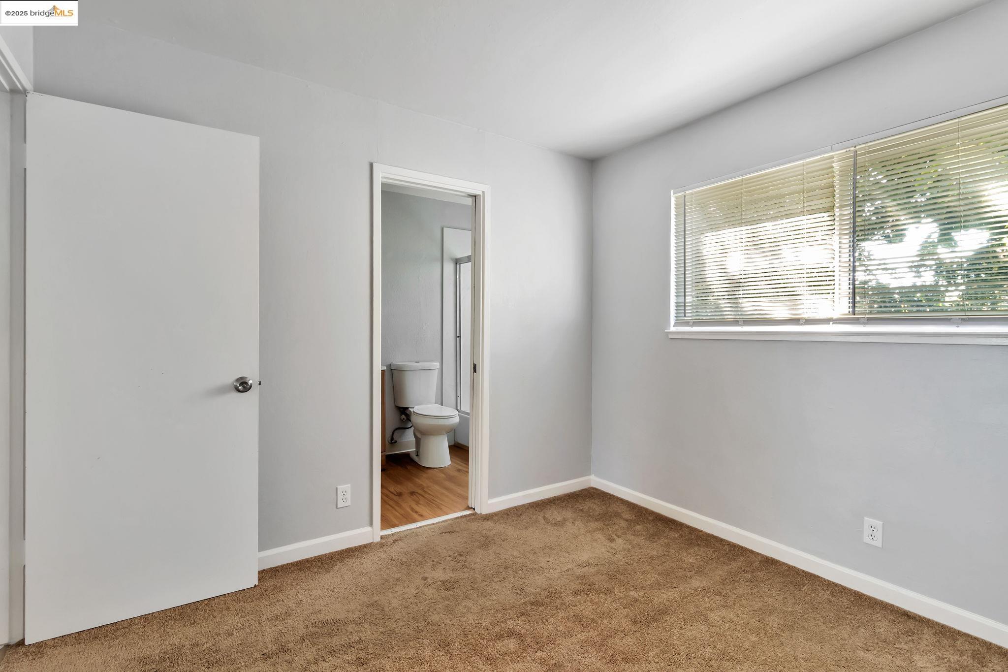 1626 Dwight Way Berkeley, CA 94703 - Photo 33 of 46 an empty room that has a window