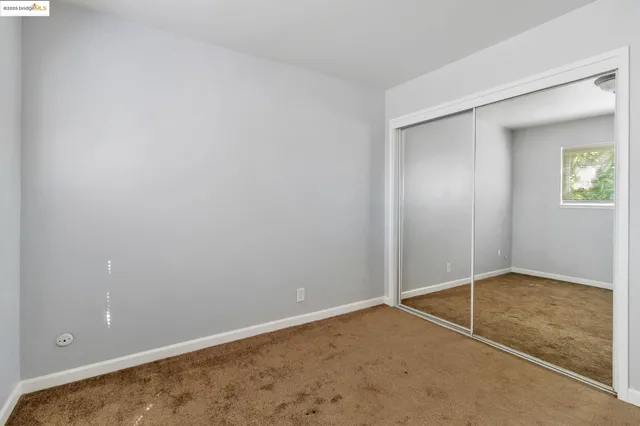 an empty room with closet
