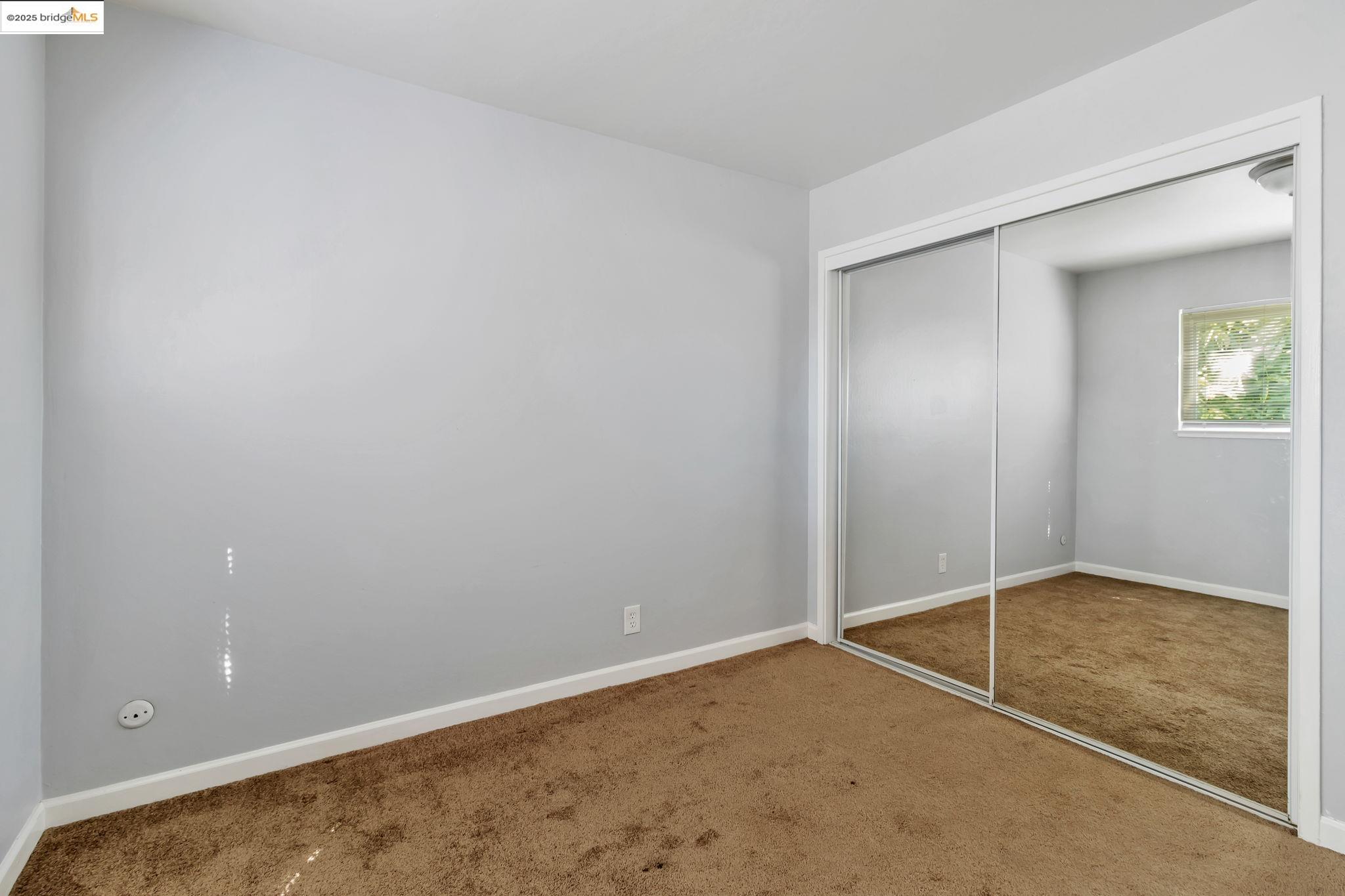 1626 Dwight Way Berkeley, CA 94703 - Photo 35 of 46 an empty room with closet