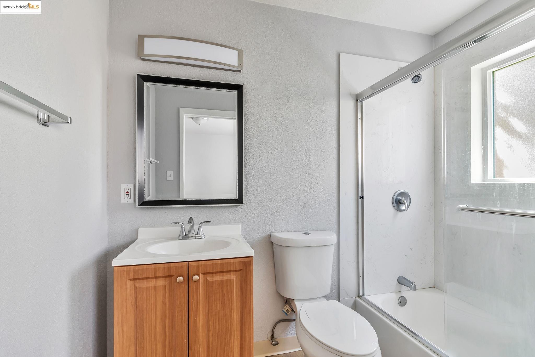 1626 Dwight Way Berkeley, CA 94703 - Photo 46 of 46 a bathroom with a sink a toilet and shower