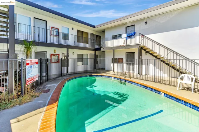 a view of a house with a swimming pool