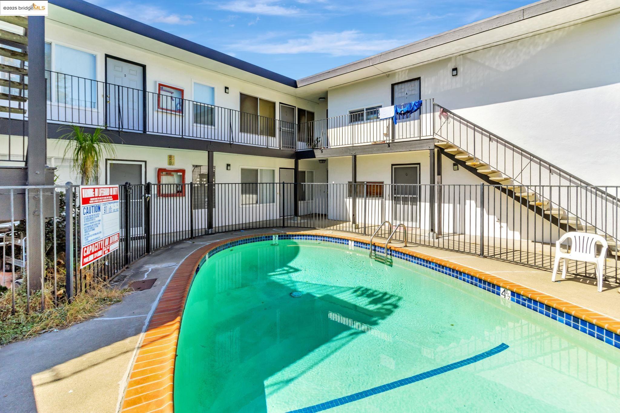 1626 Dwight Way Berkeley, CA 94703 - Photo 6 of 46 a view of a house with a swimming pool