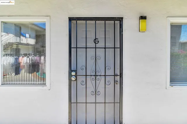 a view of staircase with white walls