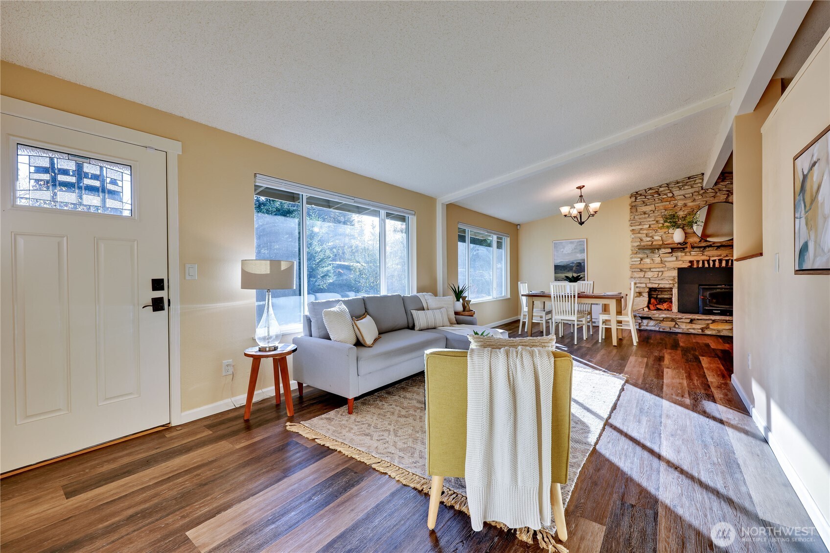 12161 South Keyport Road Northeast Poulsbo, WA 98370 - Photo 16 of 40 a living room with furniture and a large window