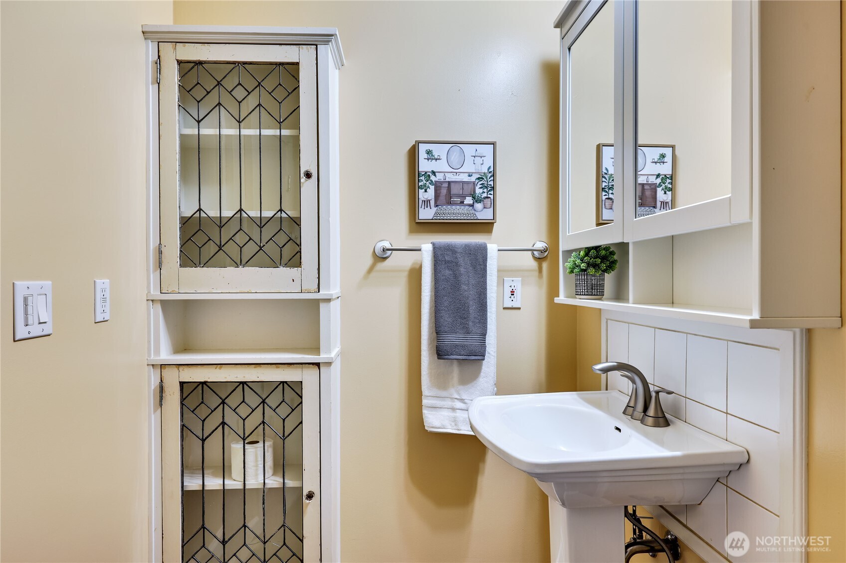 12161 South Keyport Road Northeast Poulsbo, WA 98370 - Photo 21 of 40 a bathroom with a sink and a mirror