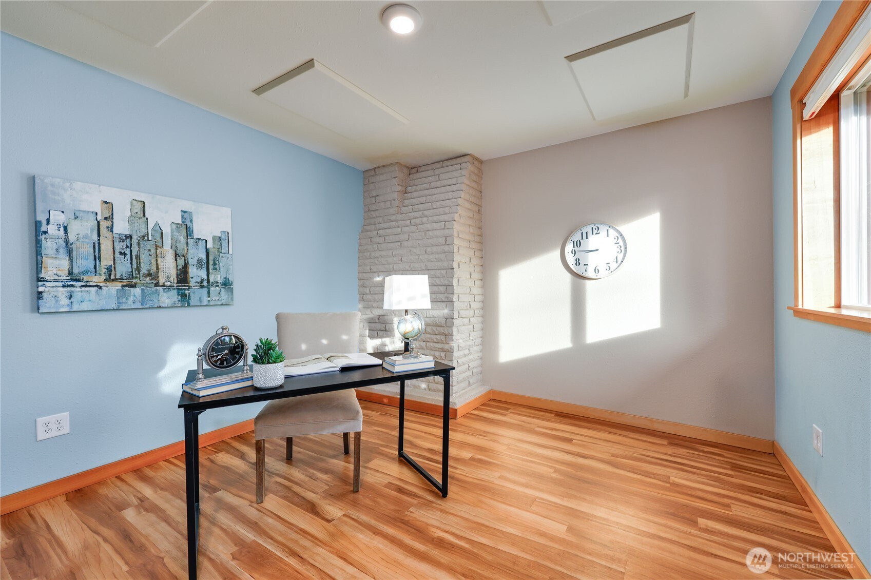 12161 South Keyport Road Northeast Poulsbo, WA 98370 - Photo 25 of 40 a workspace with furniture window and wooden floor