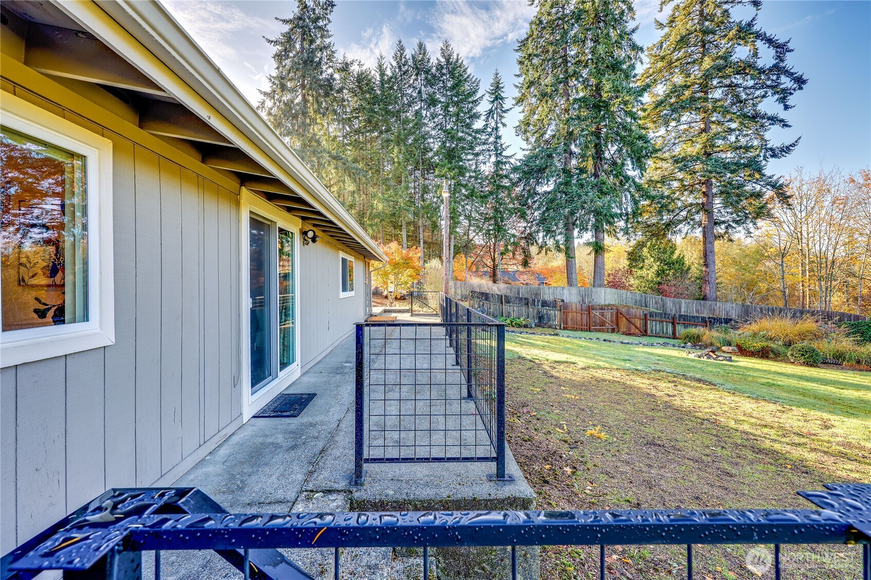 12161 South Keyport Road Northeast Poulsbo, WA 98370 - Photo 27 of 40 a view of a backyard with large trees