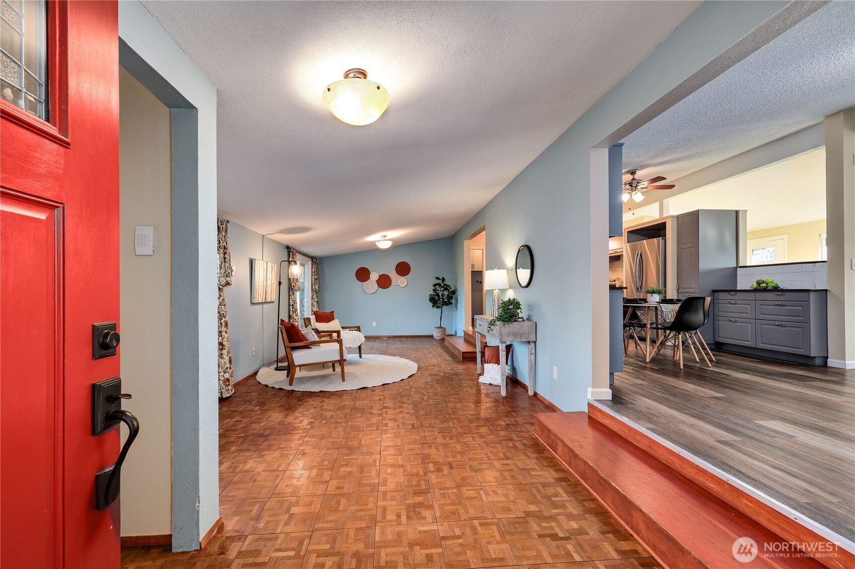 12161 South Keyport Road Northeast Poulsbo, WA 98370 - Photo 4 of 40 a dining room with furniture and a view of bedroom