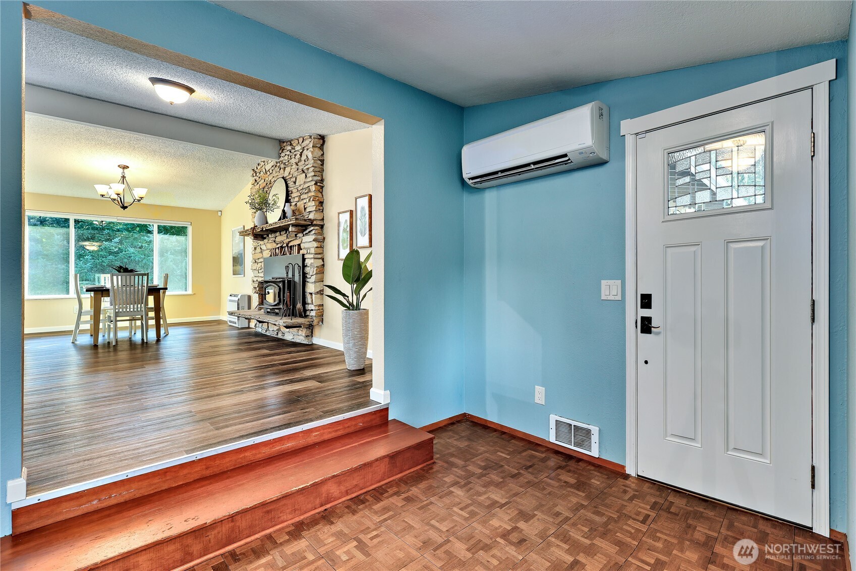 12161 South Keyport Road Northeast Poulsbo, WA 98370 - Photo 5 of 40 a view of a living room and hardwood floor