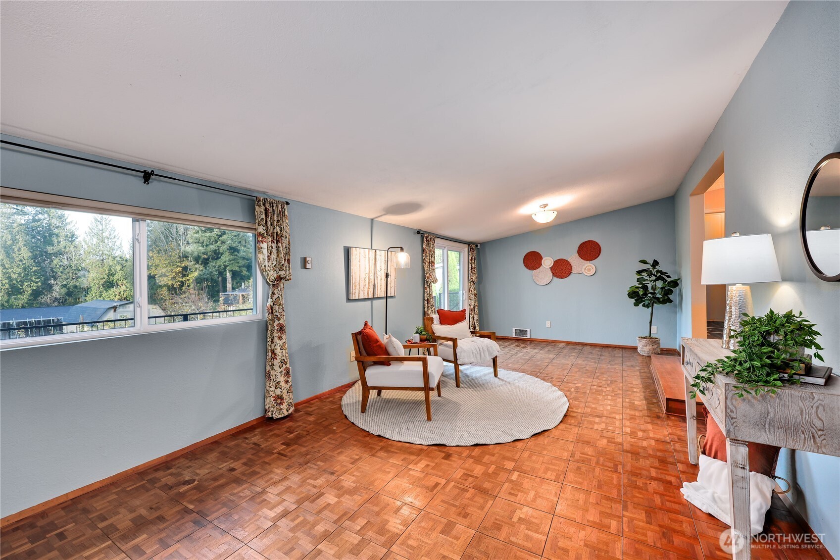 12161 South Keyport Road Northeast Poulsbo, WA 98370 - Photo 6 of 40 a living room with furniture and a large window