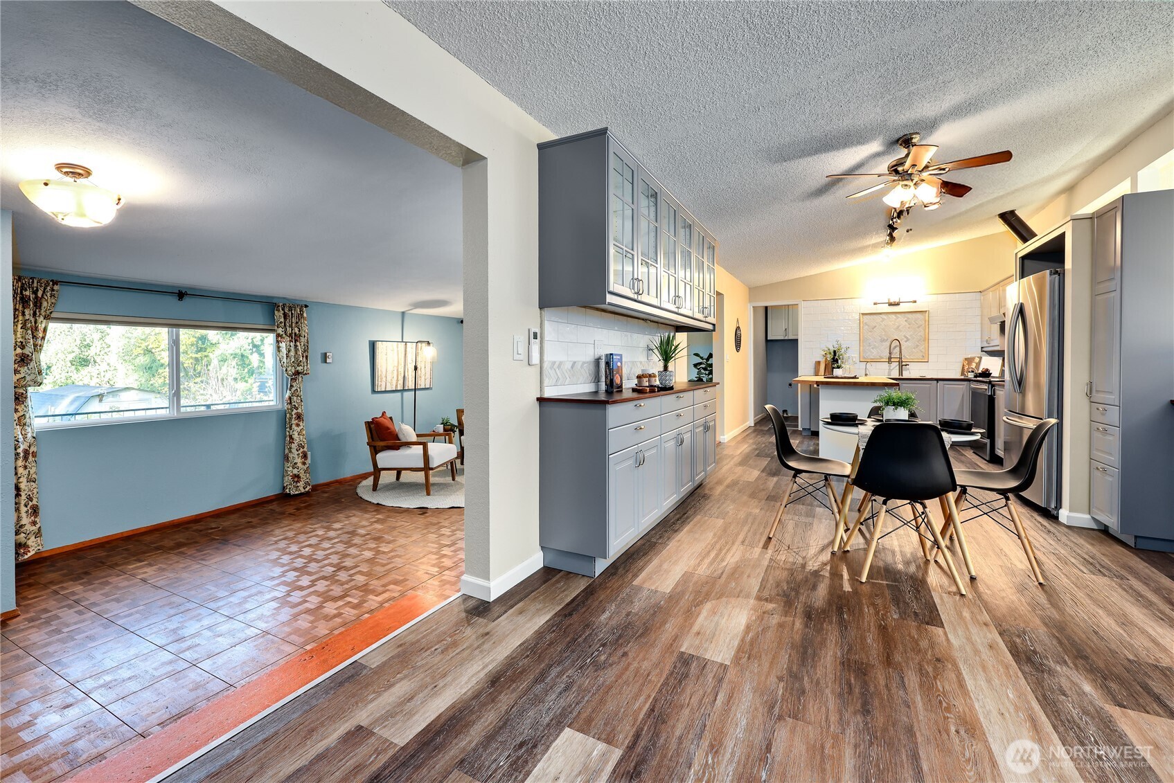 12161 South Keyport Road Northeast Poulsbo, WA 98370 - Photo 8 of 40 a living room with furniture and a wooden floor
