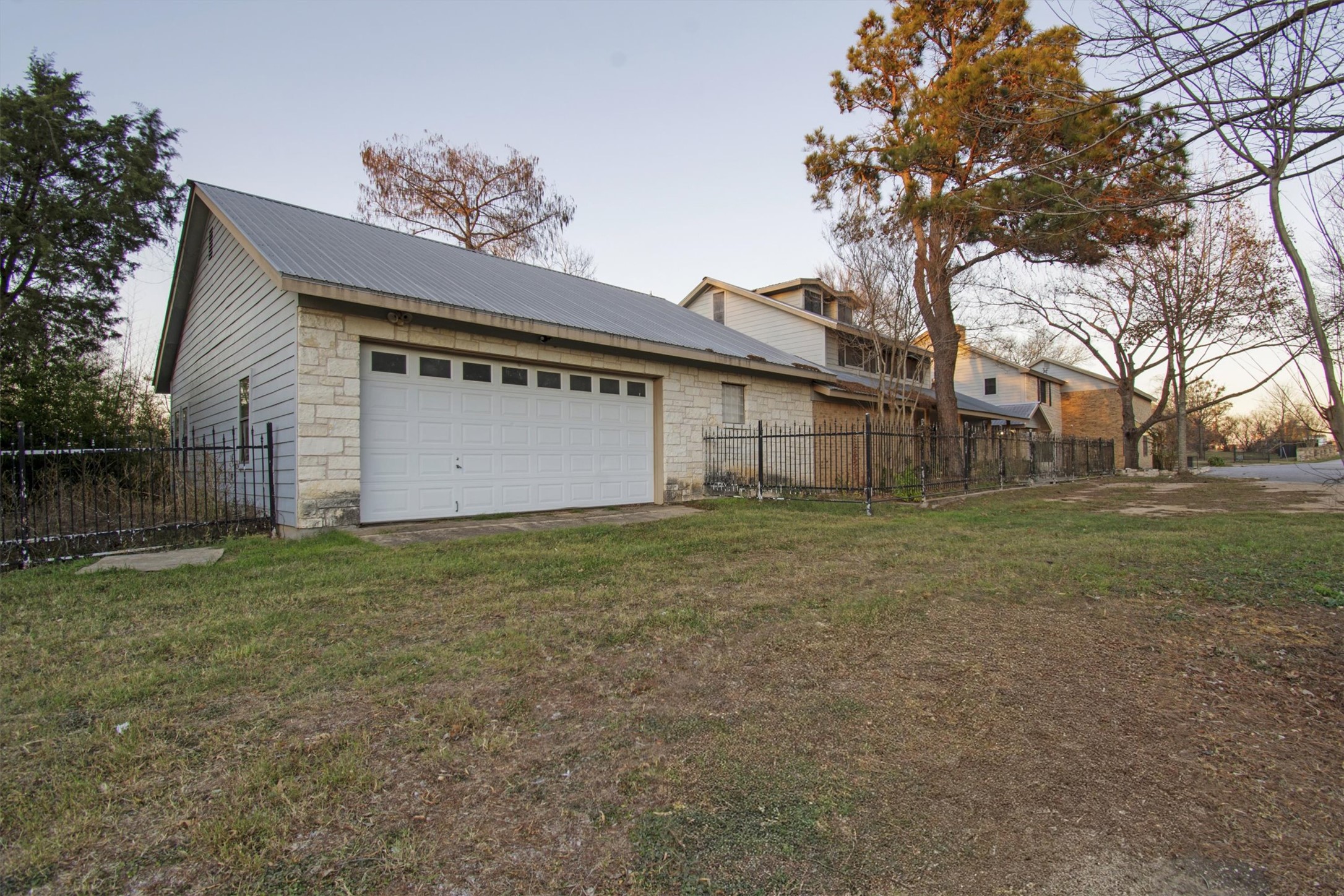 416 Depot Street Elgin, TX 78621 - Photo 19 of 21 a view of a house with a garden