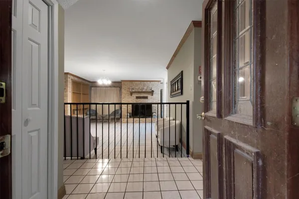 a view of a hallway with windows