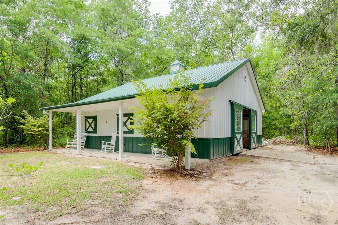 479 Squirrel Run Rincon, GA 31326 - Photo 31 of 43 Morton Horse Barn