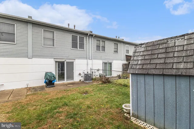 a picture of a bench in front of door